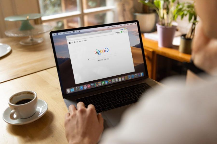 google search engine on laptop at kitchen table